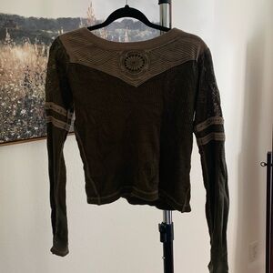 Free people shirt with brown detail.